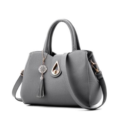 Bolso de mano para mujer, bolso con borlas para mujer, bolsos de mano de cuero PU de alta calidad, bolso de hombro breve para mujer, bolsos para mujer