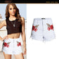 Embroidered loose beard jeans women's shorts