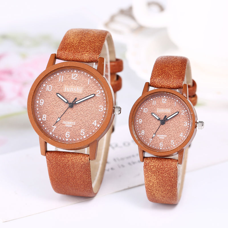 Relojes de cuarzo para parejas de moda informal para hombres y mujeres.