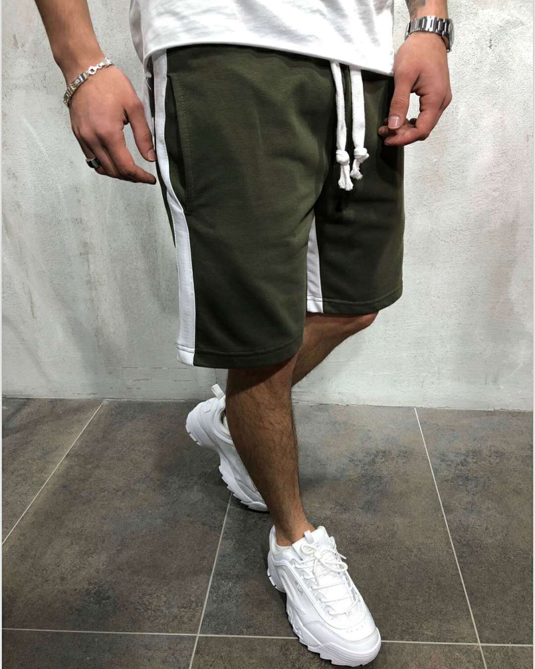 Pantalones cortos de nuevo estilo Pantalones cortos deportivos y de ocio Pantalones cortos de cinco puntos para hombres